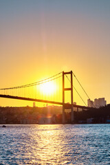 Bosphorus bridge at sunset, view of the European part of the city