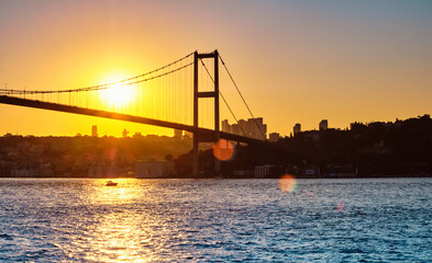 Bosphorus bridge at sunset, view of the European part of the city