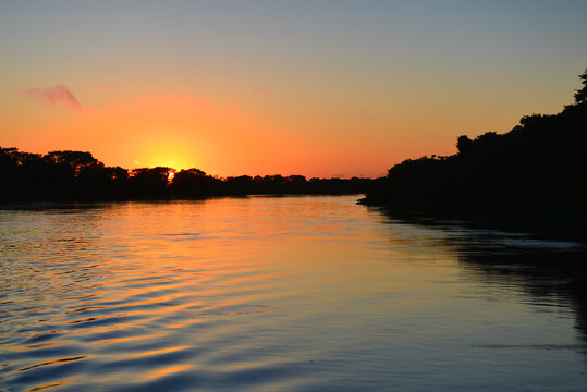 Sunrise on the rainforest-lined Guapor&eacute;-Itenez river near the remote village of Remanso, Beni Department, Bolivia, on the border with Rondonia state, Brazil