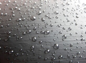 rain drops on glass window , copy space background can be used for emotional content background