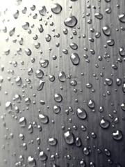 rain drops on glass window , copy space background can be used for emotional content background