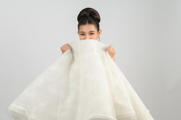 Young asian beautiful bride smiling with happy on white background