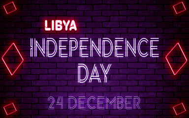 Fototapeta premium Happy Independence Day of Libya, 24 December. World National Days Neon Text Effect on bricks background