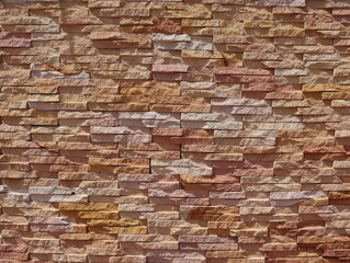 Sandstone bricks wall of the house