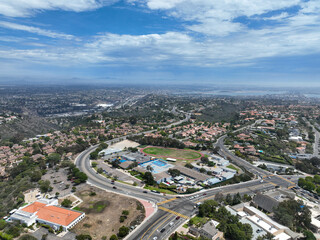 Fototapeta na wymiar Aerial view over La Jolla Hills with big villas and ocean in the background, San Diego, California, USA