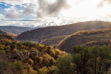 Mountain Landscape with Fall Color Trees. Sunny autumn day. France, Europe. Nature Background