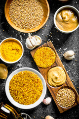 Different types of mustard with garlic.
