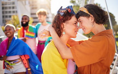 Obraz premium Pride, lesbian couple and march for lgbtq community, queer and young people in city, outdoor or protest. Love, women and friends in town, relationship or happiness for human rights, freedom and smile