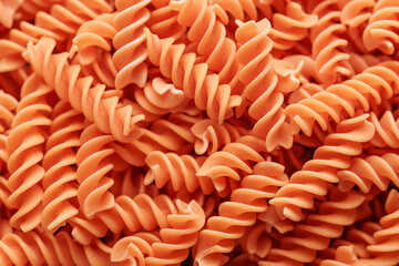 Obraz premium Pasta from red lentils. Gluten-free fusilli pasta.