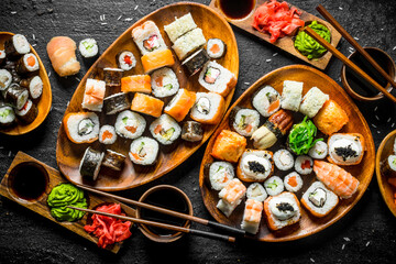 Set of traditional Japanese food sushi with soy sauce and ginger.