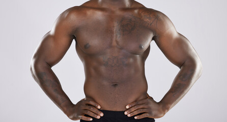 Fototapeta na wymiar Fitness, closeup and muscular black man, health and wellness with guy on grey studio background. Nigerian male, confident athlete or bodybuilder with torso, stomach and muscles with grooming and pecs