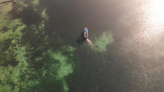 Tropical Island Drone Footage. Caye Caulker in Belize. Aerial Drone of Paradisiac Island.