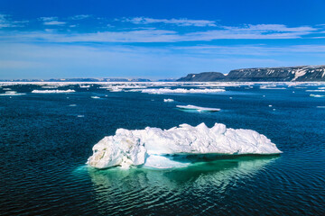 Ice floes at the rocky coastline of Svalbard © Lars Johansson
