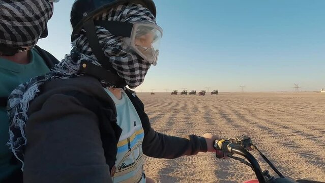 Safari Ride Buggies and Quad Bikes Through the Desert Hurgada, Egypt. Adventures of Desert Off-road on Atv.sand and Sand Borkhan. Rock and Sunset. Quad Cycle Travel. Excursion With People.