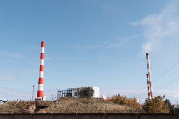 Fototapeta na wymiar Coal-fired thermal power plant with pipes