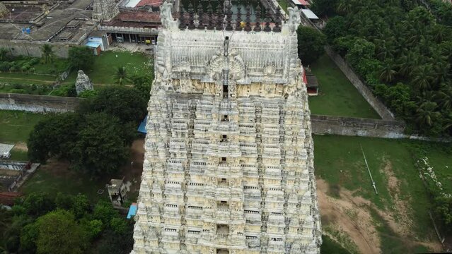 Top view of Sri Kanchi Kamakshi Amman Temple in Kanchipuram, Tamil Nadu. Bird's-eye view of the temple tower with God, and animal sculptures which are carved and sculpted mostly out of sandstone.
