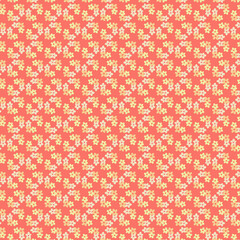 Simple small spring flowers flat lay on a coral pink background Rustic style fabric fashion trend