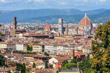 Fototapeta na wymiar Florence cityscape with Duomo cathedral and Palazzo Vecchio palace over city center, Italy