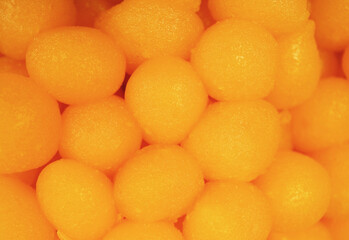 Pile of Khanom Thong Yod or Gold Egg Yolks Drops, One of Nine Auspicious Traditional Thai Desserts