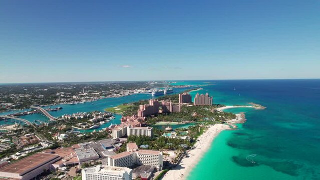 Atlantis Resort, Paradise Island, Bahamas. Vibrant 4K drone shot of beachfront resorts.