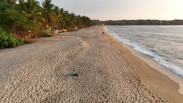 Sayulita, Mexico's main beach and town. Establishing Aerial Fly Drone View 4k high resolution.