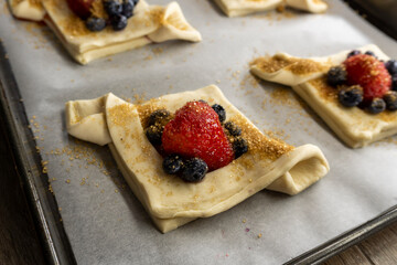 Puff pastry with strawberries and blueberries. food concept