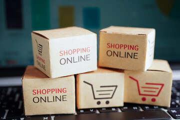 Online shopping, Shopping cart box on business graph, import export, finance commerce.