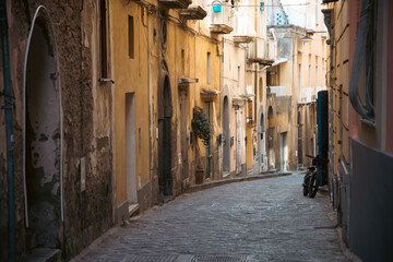 Colorful houses and tiny narrow streets on Procida Island, Italy.