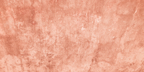 Abstract grunge soft red or orange painted wall texture, soft red decorative grunge texture with various white and blue stains.