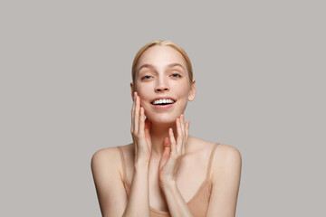 Beautiful young woman with clean fresh skin. Female beauty face care. Facial treatment.