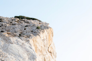 Standing empty on top of a mountain view, Blank space cliff edge with mountain on clouds blue sky