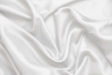 Obraz premium Smooth elegant white silk fabric or satin luxury cloth texture for abstract background