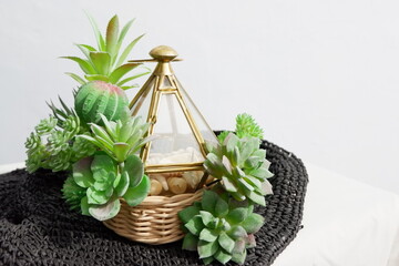 a ring box with a rustic feel decorated with succulent flowers