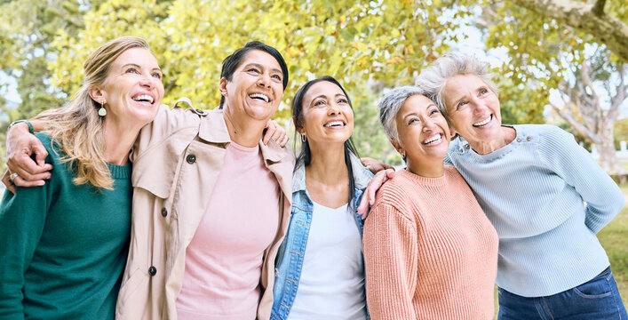 Senior women, people or bonding hug while bird watching in nature park, spring garden or relax environment. Smile, happy or diversity elderly friends in retirement support, trust or community social