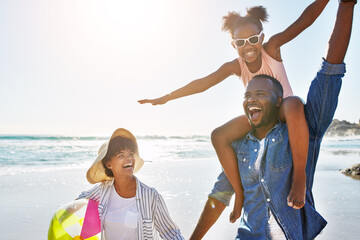 Family, beach and girl on shoulder of father enjoying holiday, vacation and freedom on weekend. Summer, travel and happy dad, mom and child smile on adventure for bonding, relaxing and fun by ocean
