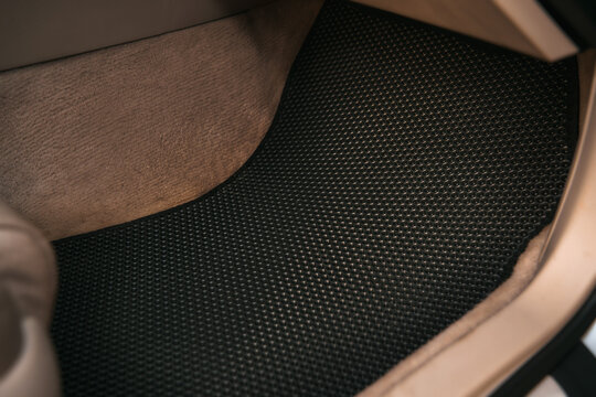 eva floor mats car mats close up macro graphite gray. black floor mat to protect the vehicle interior.