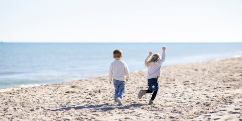 Two toddlers having fun outdoors