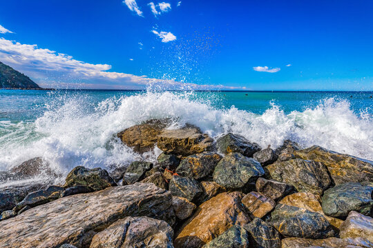 Waves crash the coast of Levanto, Italy