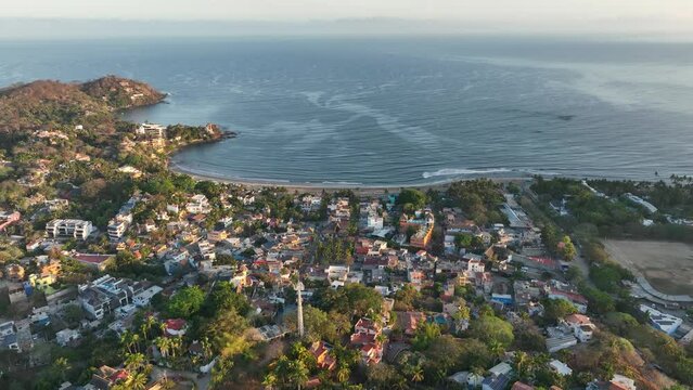 Sayulita, Mexico's main beach and town. Establishing Aerial Fly Drone View 4k high resolution.