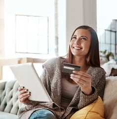 Thinking, credit card and online shopping on digital tablet by woman on sofa for payment or booking online. Idea, girl and online banking with debit card for credit score, purchase and online order
