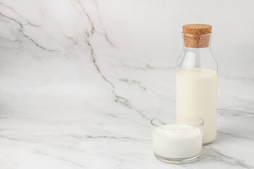 homemade yogurt, kefir, fermented milk on a light background. Healthy, clean eating. Vegan or gluten free diet