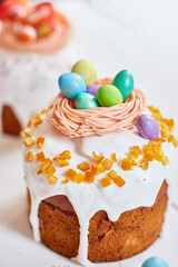 Easter cake with chocolate eggs decoration, on white wooden table the holiday, Happy Easter Holiday.