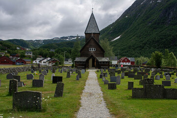 Fototapeta na wymiar Traditional wooden church in the mountains of Norway