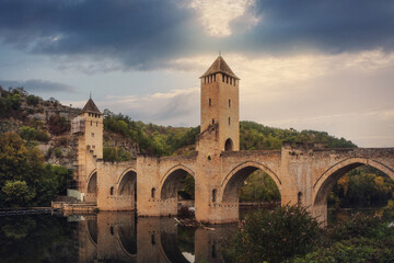 Fototapeta na wymiar Pont Valentre is a medieval arched stone bridge over the river Lot in the city of Cahors in southern France.