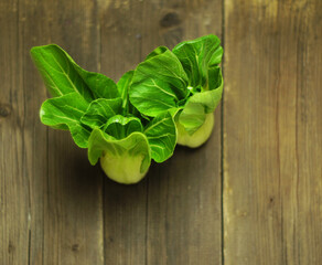 Bok choy on wooden background