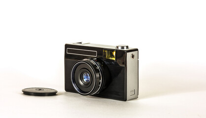 Retro camera for taking pictures on film on a light background