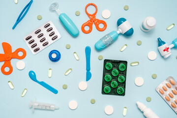 Various medical tools on blue background. Flat lay. Healthcare and medical concept