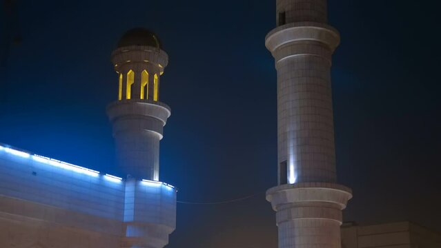 The functioning central mosque in the city of Almaty, built in the Muslim style, fascinates with its beautiful view at night in the light of powerful spotlights