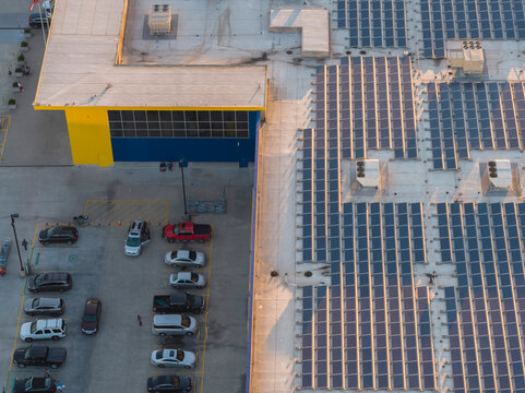 Solar panels on roof of commercial building, Atlanta, Georgia, USA - Powered by Adobe