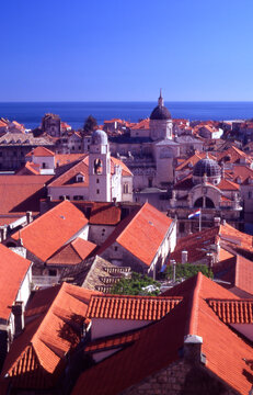 Croatia. Dubrovnik. Terracotta roof tiles of the old city, The Cathedral, and St Blaise Church.